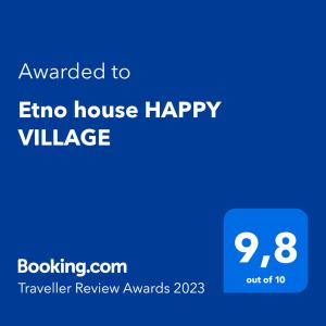 un téléphone bleu avec le texte attribué pour faire écho au village heureux de la maison dans l'établissement Etno house HAPPY VILLAGE, à Cetinje