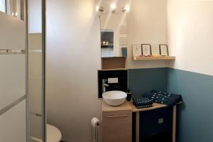 Kúpeľňa v ubytovaní La petite Boutique Bleue