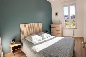 Posteľ alebo postele v izbe v ubytovaní La petite Boutique Bleue