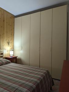 Кровать или кровати в номере CASA ATELETA (roccaraso)