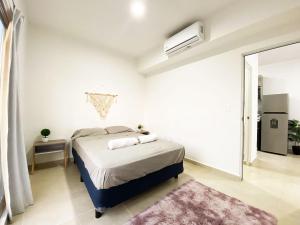 Postel nebo postele na pokoji v ubytování El Wayak - Con Piscina Parking y Parque + 32 fotografií