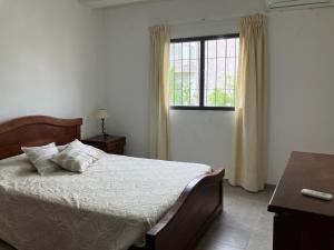 Una cama o camas en una habitación de Departamento centro