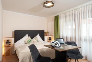 Letto o letti in una camera di Gasthof Rieder Stubn Hotel#Restaurant#Pinseria
