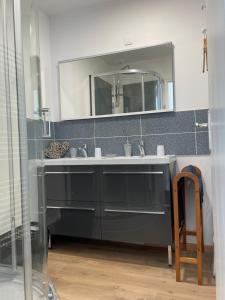 Koupelna v ubytování Gîte Au bord du Halage + 10 fotografií