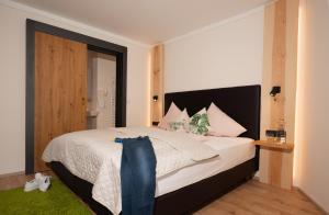 Letto o letti in una camera di Gasthof Rieder Stubn Hotel#Restaurant#Pinseria