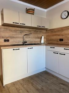 Η κουζίνα ή μικρή κουζίνα στο Ferienhaus Janne +22 φωτογραφίες
