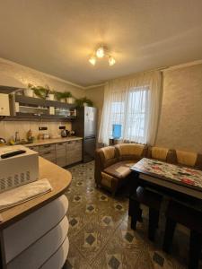 Kuchyň nebo kuchyňský kout v ubytování Forsage Hostel