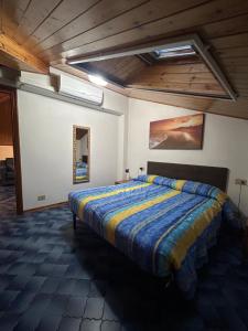 a bedroom with a large bed in a room at La Moretta in Levanto