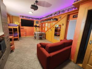 Televízia a/alebo spoločenská miestnosť v ubytovaní Casa Vacanza Relax&Barbecue Sondrio