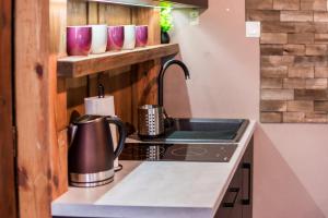 Kuchnia lub aneks kuchenny w obiekcie Apartament gościnny