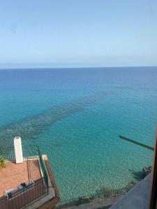 a view of the ocean from a balcony at La Casa di Giorgio in Marina di Camerota