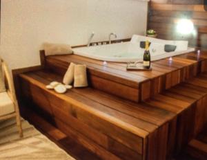 A bed or beds in a room at LC Luxury Apartment