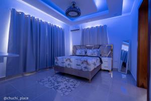 Ένα ή περισσότερα κρεβάτια σε δωμάτιο στο Chuchi Place +9 φωτογραφίες