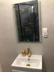 Kúpeľňa v ubytovaní Apartament Wygodny S2