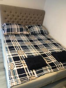 Posteľ alebo postele v izbe v ubytovaní Apartament Wygodny S2