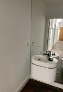 Et badeværelse på Garbary Residence in Poznań + 6 billeder