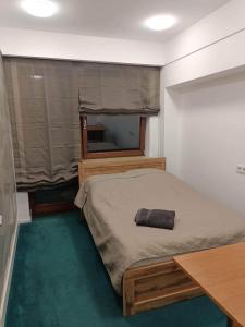 En eller flere senge i et værelse på Garbary Residence in Poznań