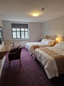 Postel nebo postele na pokoji v ubytování Home Inn