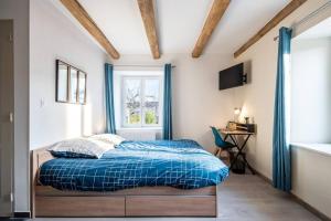 Posteľ alebo postele v izbe v ubytovaní Un refuge douillet et moderne au cœur d'Audincourt
