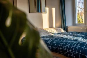 Posteľ alebo postele v izbe v ubytovaní Un refuge douillet et moderne au cœur d'Audincourt