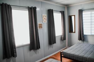 Postel nebo postele na pokoji v ubytování Olive Hostel Roxas City