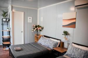 Postel nebo postele na pokoji v ubytování Olive Hostel Roxas City
