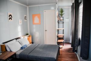 Postel nebo postele na pokoji v ubytování Olive Hostel Roxas City