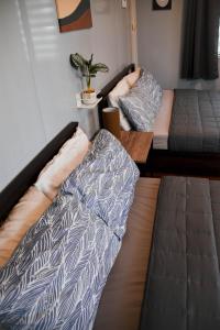 Postel nebo postele na pokoji v ubytování Olive Hostel Roxas City