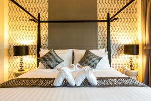 Postel nebo postele na pokoji v ubytování Pimann Buri Pool Villas Ao Nang Krabi Sha Plus + 13 fotografií