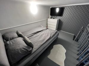 Posteľ alebo postele v izbe v ubytovaní Dave Apartman 2