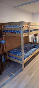a couple of bunk beds in a room at Casa do Carregal in Braga