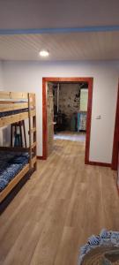 a room with two bunk beds and a mirror at Casa do Carregal in Braga