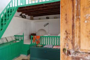 A balcony or terrace at Casa Angelina Lindian House with large garden