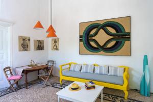 A seating area at Casa Angelina Lindian House with large garden