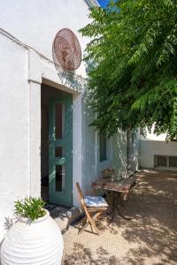 A garden outside Casa Angelina Lindian House with large garden