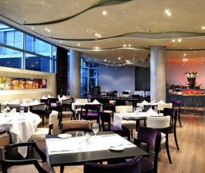 A restaurant or other place to eat at Golden Tulip Zira Belgrade