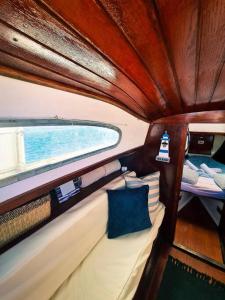 a view of the inside of a boat with a window at VEGA-Boat House in Ilha da Culatra