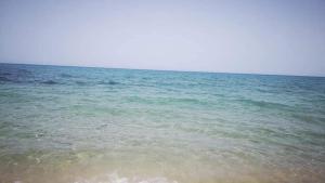 a view of the ocean from the beach at Residence les Jasmins in Sousse