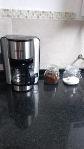 a coffee maker sitting on top of a counter at USHUAIA FOR´NS in Ushuaia