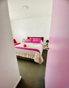 Un ou plusieurs lits dans un hébergement de l'établissement Habitación Doble dentro de una casa