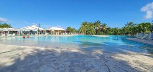 Bazén v ubytování Grand studio Tropical idéalement situé, jardin et piscine nebo v jeho okolí