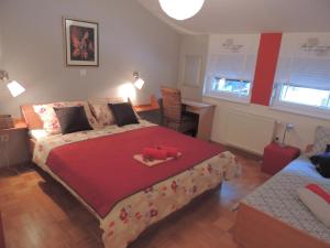 Postel nebo postele na pokoji v ubytování Apartment Alvarium
