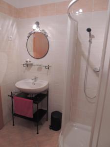 Koupelna v ubytování Apartment Alvarium + 16 fotografií