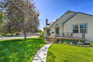 a house with a walkway in front of a yard at Charming Idaho Home cottage in Twin Falls