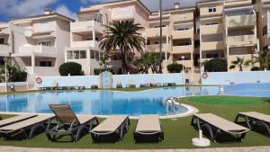 Bazén v ubytovaní Chayofa Paraiso, apartamento Tenerife Sur alebo v jeho blízkosti