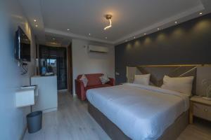 Elite Pyramids Boutique Hotel客房内的一张或多张床位