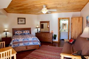Voodi või voodid majutusasutuse Red Moon Lodge toas