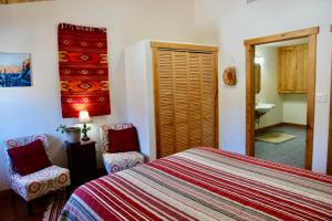 Voodi või voodid majutusasutuse Red Moon Lodge toas