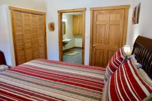 Voodi või voodid majutusasutuse Red Moon Lodge toas