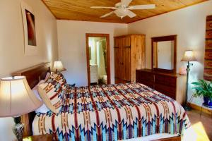 Voodi või voodid majutusasutuse Red Moon Lodge toas